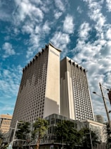 a tall building with a sign on it