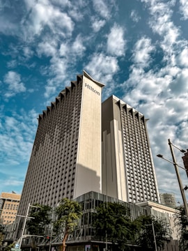 a tall building with a sign on it