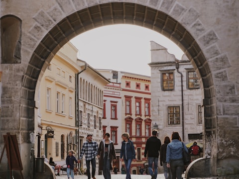 A group enjoying a guided food tour in a historic neighborhood