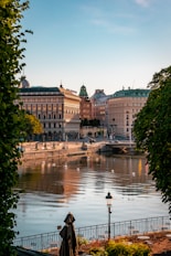 a body of water with buildings around it