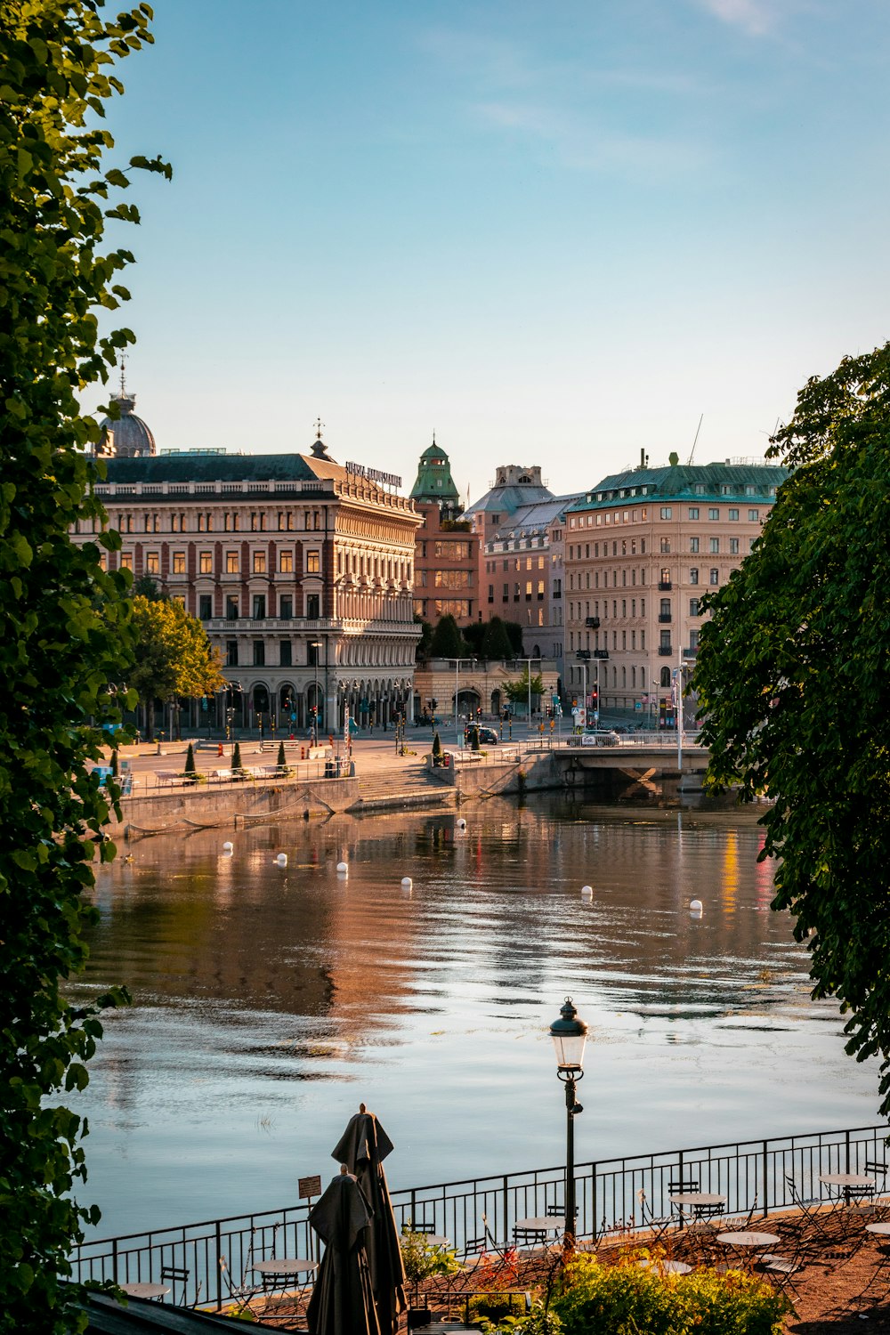 a body of water with buildings around it