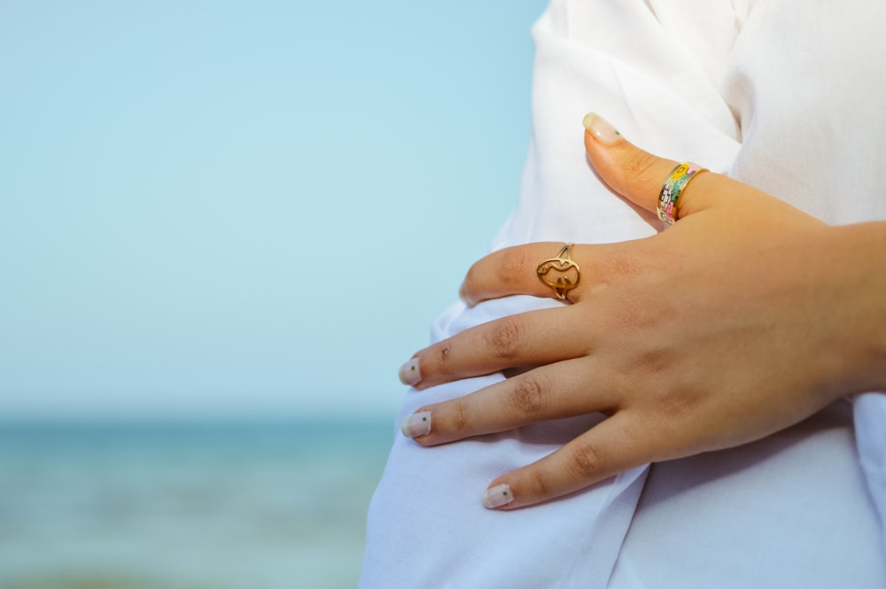 a person holding the hands together