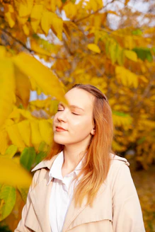 a person standing under a tree