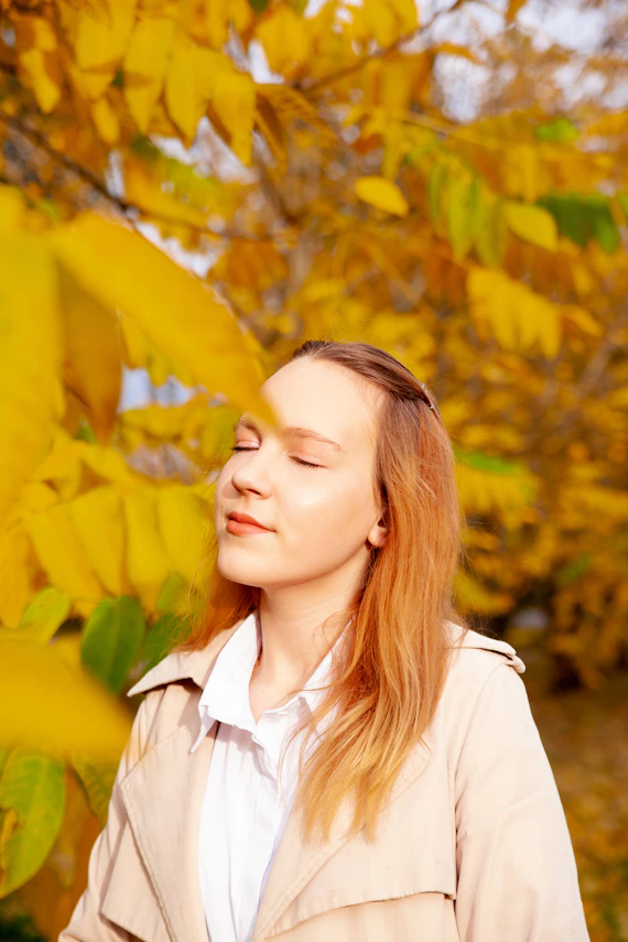 a person standing under a tree