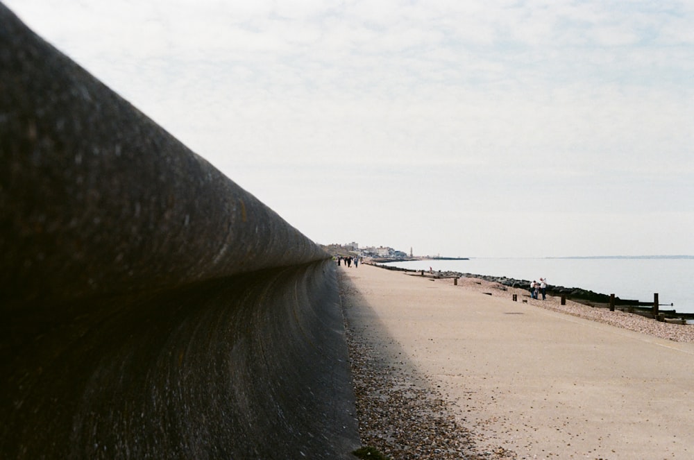 a road next to a beach