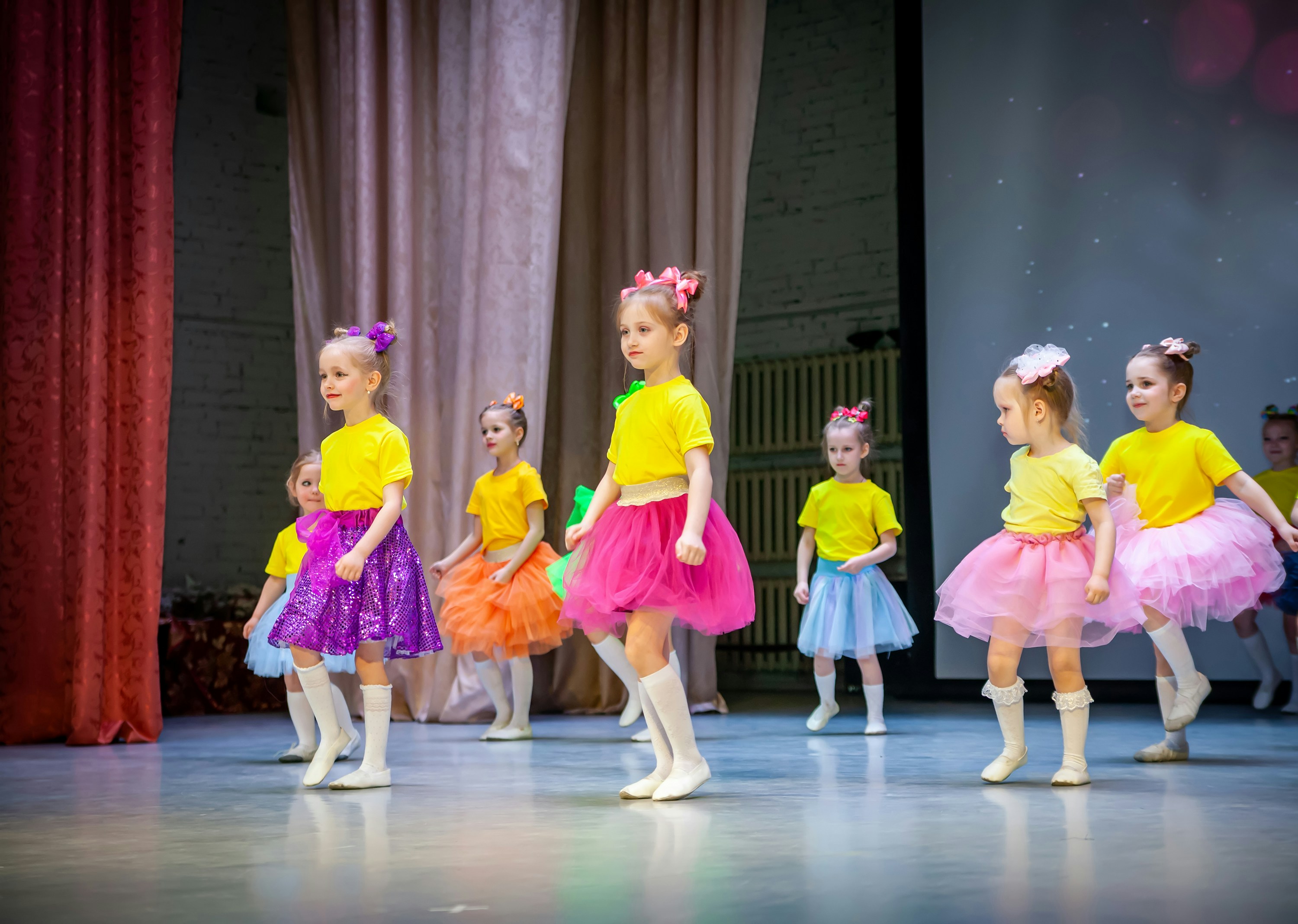a group of children in a performance
