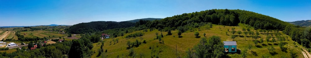 a landscape with trees and buildings