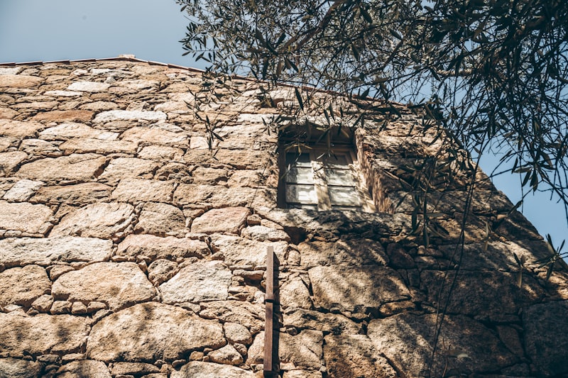 a stone building with a window