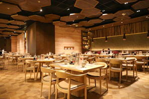 a large room with tables and chairs