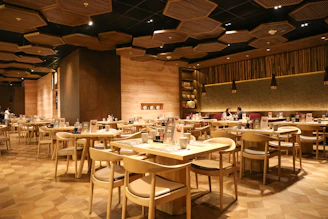 a large room with tables and chairs
