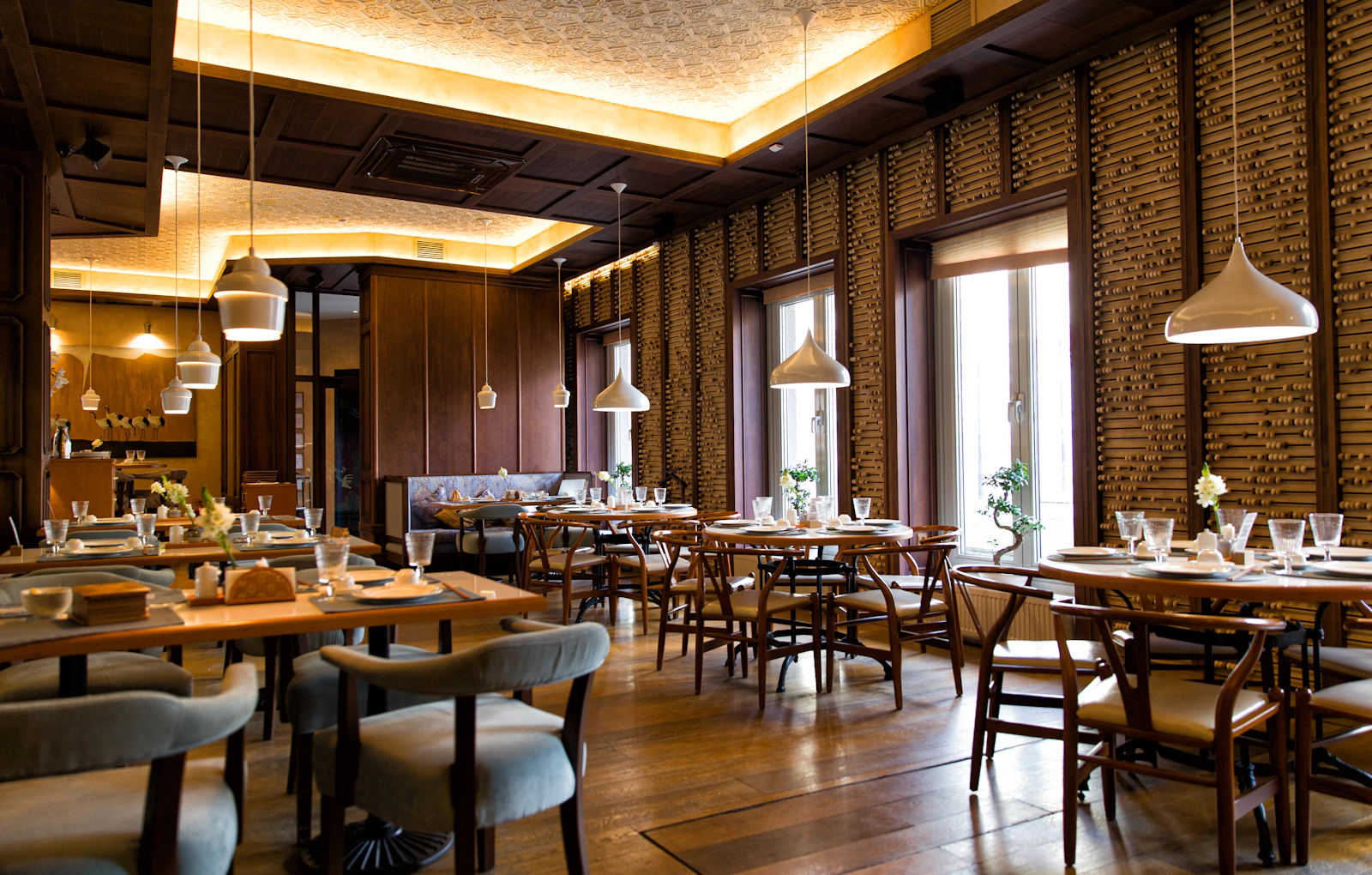 Restaurant interior with tables and chairs
