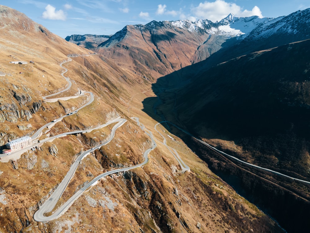 a winding road through a valley