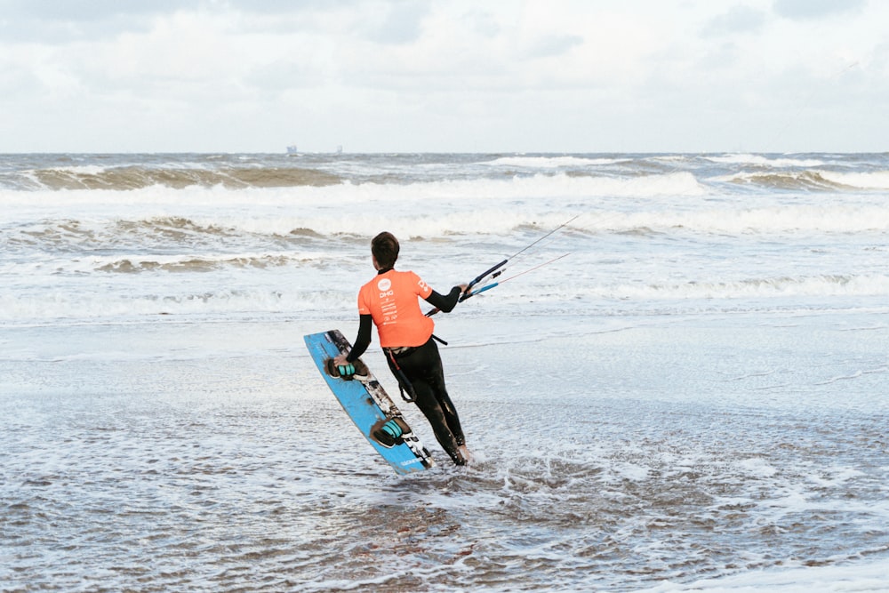 a man on a surfboard in the ocean