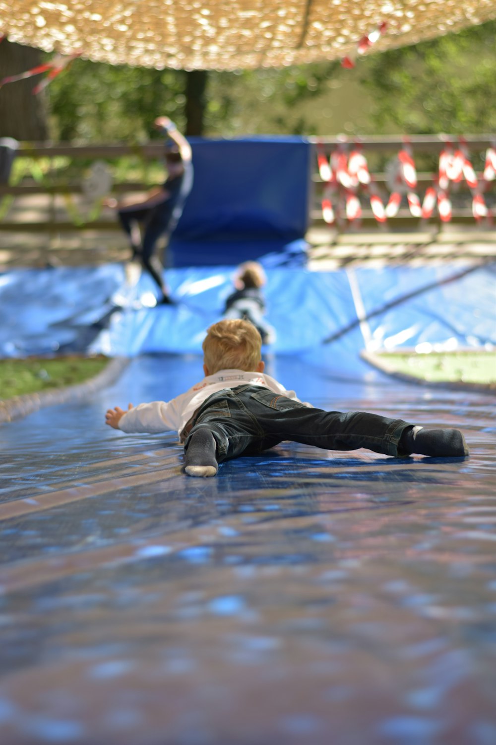 a boy falling off a diving board