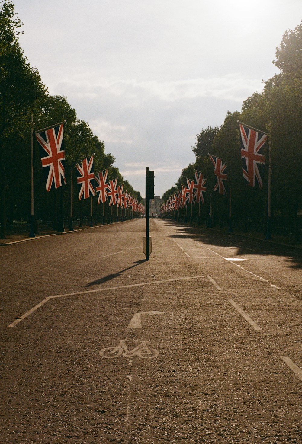 a road with flags on the side