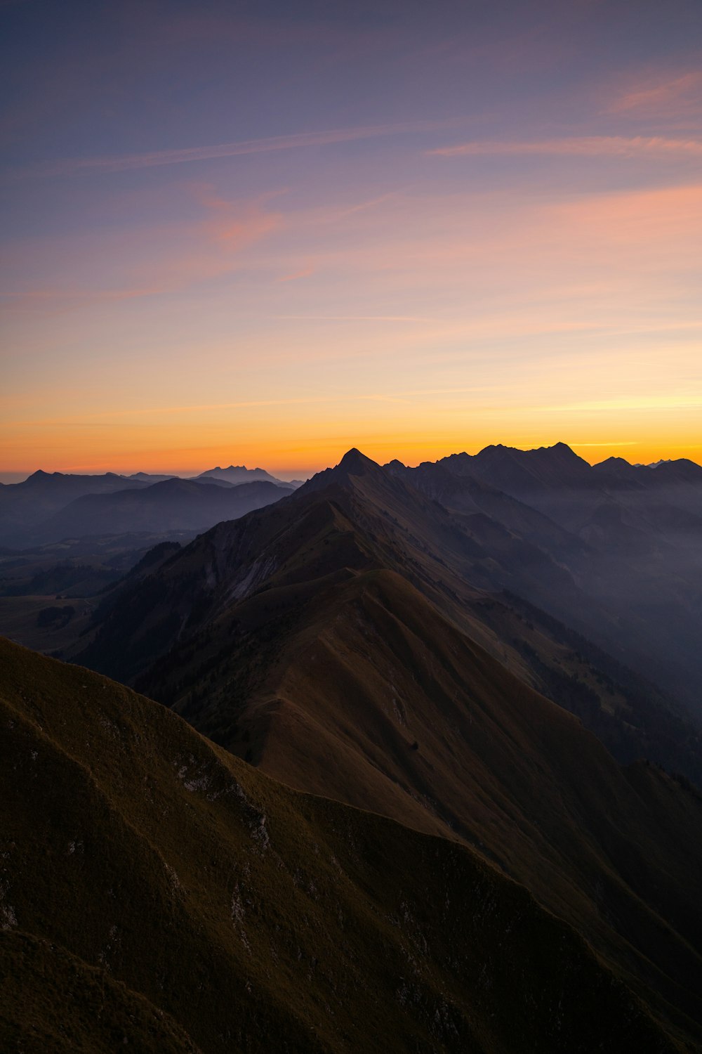 a mountain range with a sunset