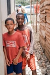 a couple of boys posing for the camera