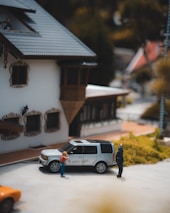 a police car parked in front of a house