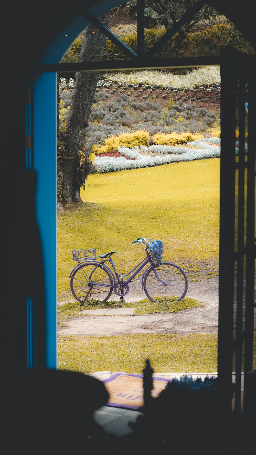 a bicycle parked on a sidewalk