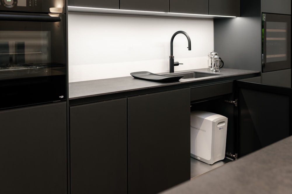 a kitchen with stainless steel appliances