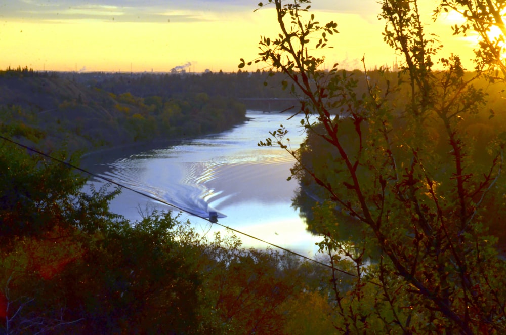 a river with a bridge over it