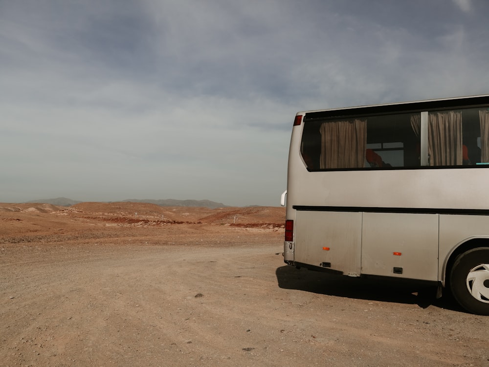 a white van parked in a desert
