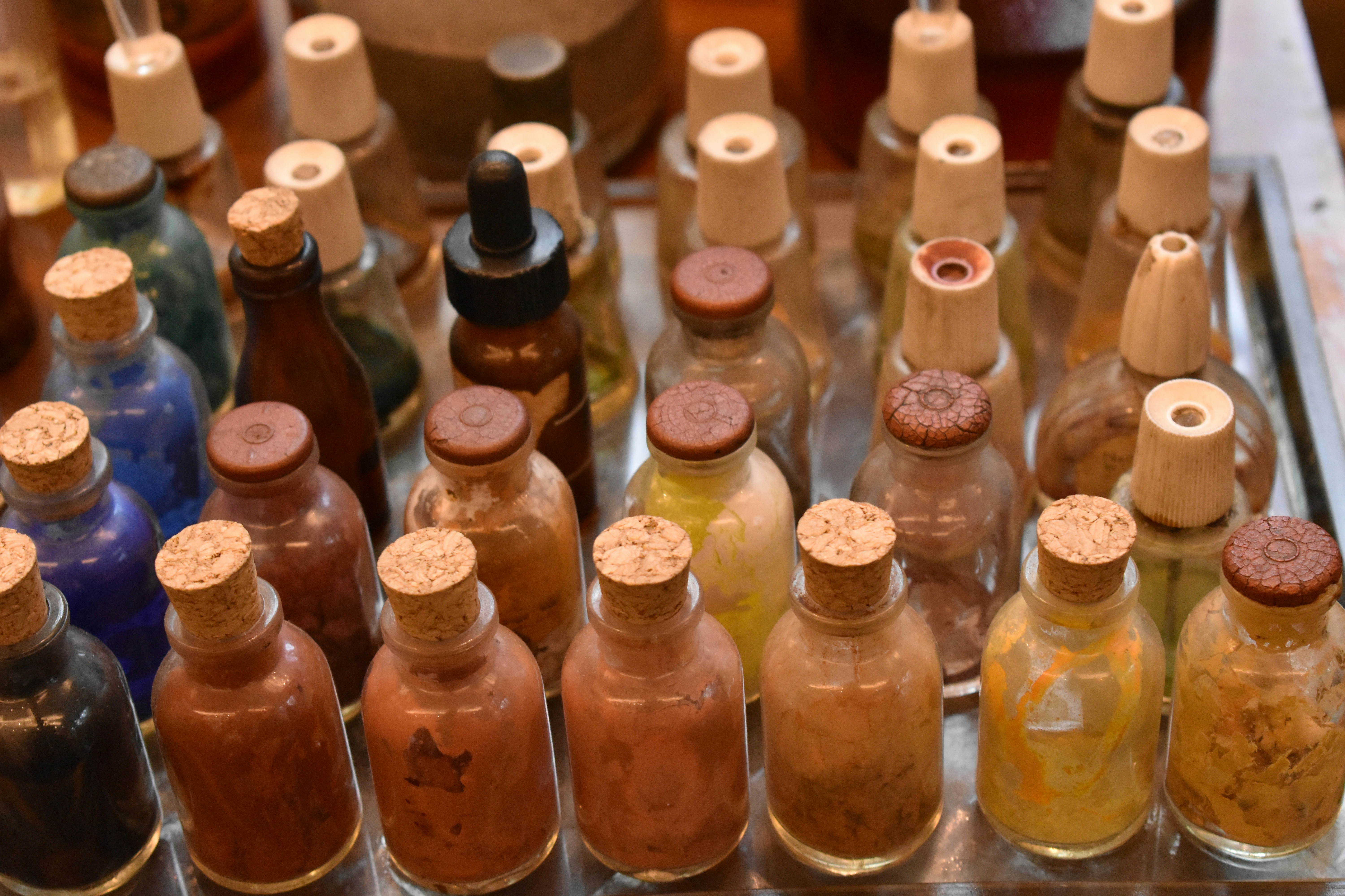 A selection of colorful e-liquid bottles for refillable vapes