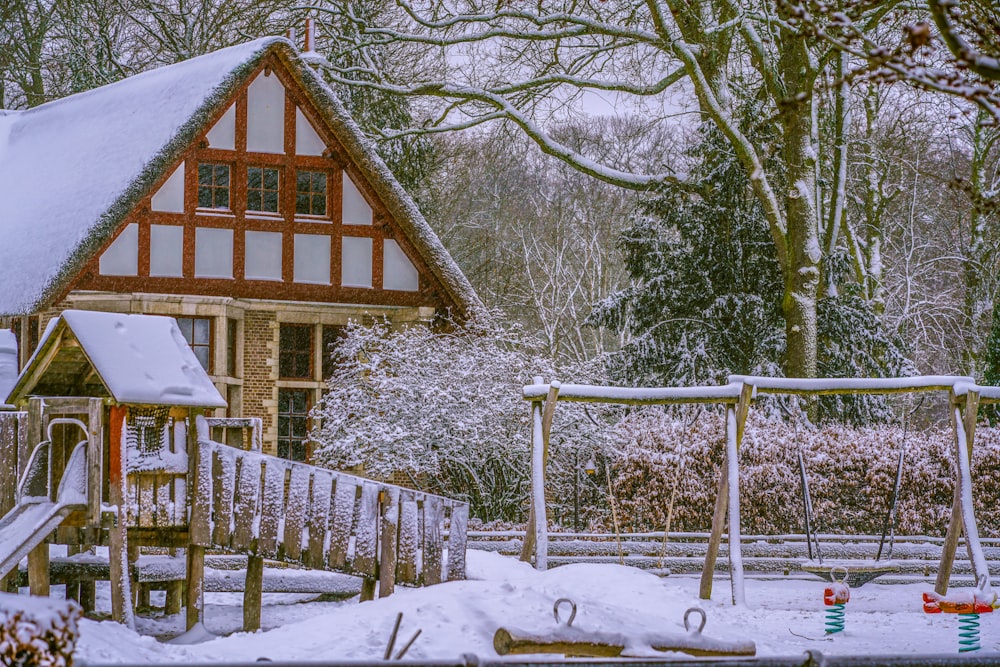 a house with a fence and trees around it