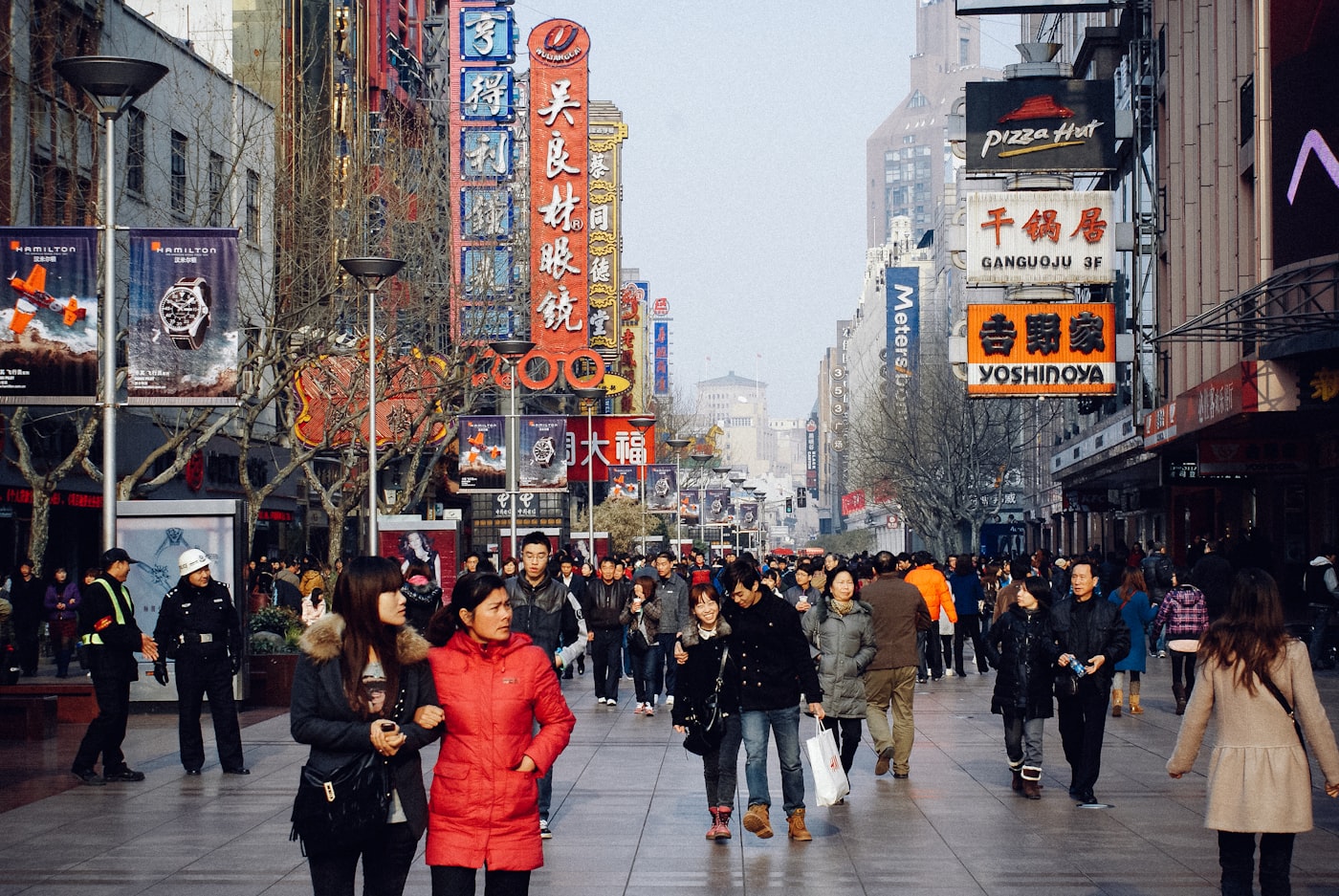 Chinese consumers shopping on Nanjing Road in Shanghai, one of China's busiest retail streets