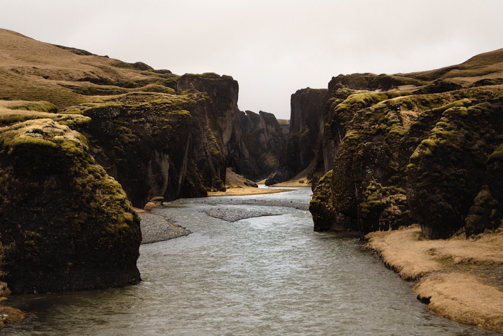 a river running between rocky cliffs