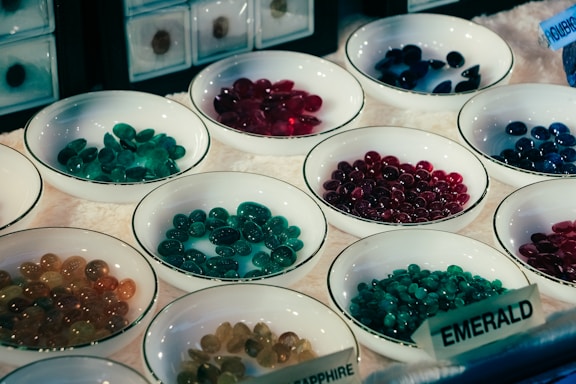 a table full of bowls of berries