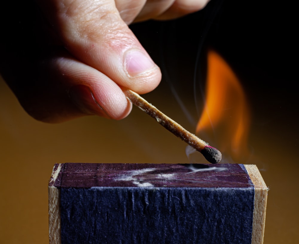 a person holding a metal object