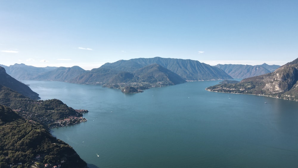 a body of water surrounded by mountains