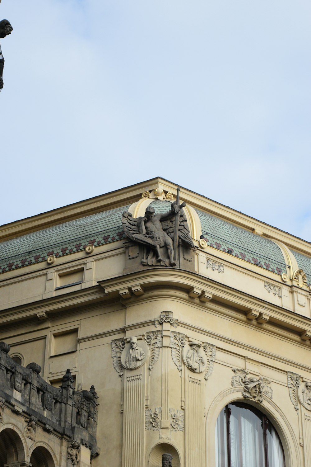 a statue on the side of a building