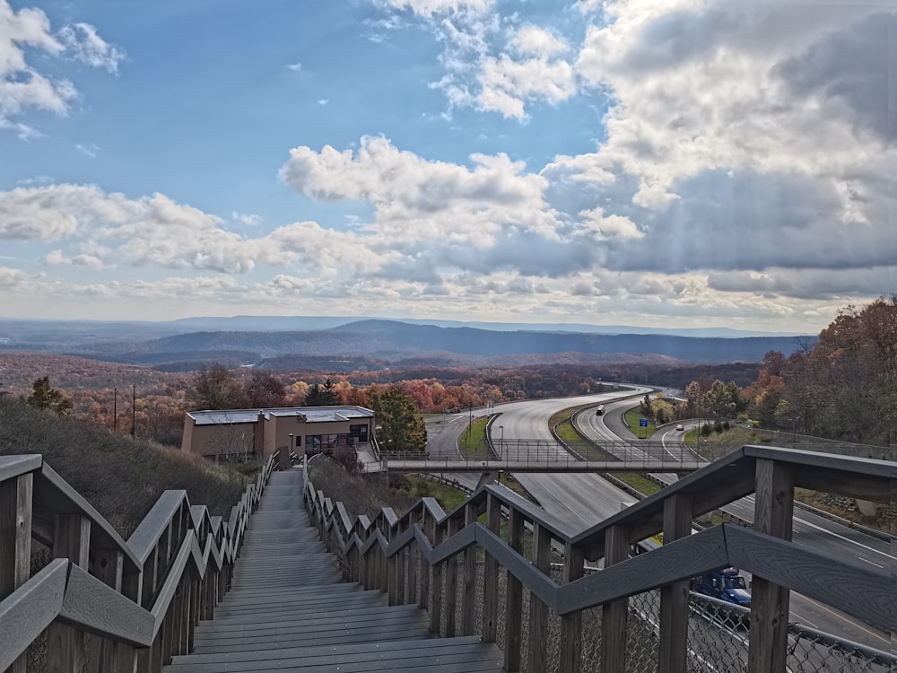 a wooden bridge over a town