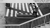Vintage-style photo of a skater grinding a rail, echoing classic Dogtown vibes.