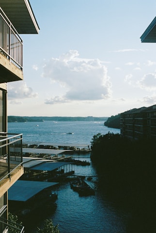 a body of water with buildings around it