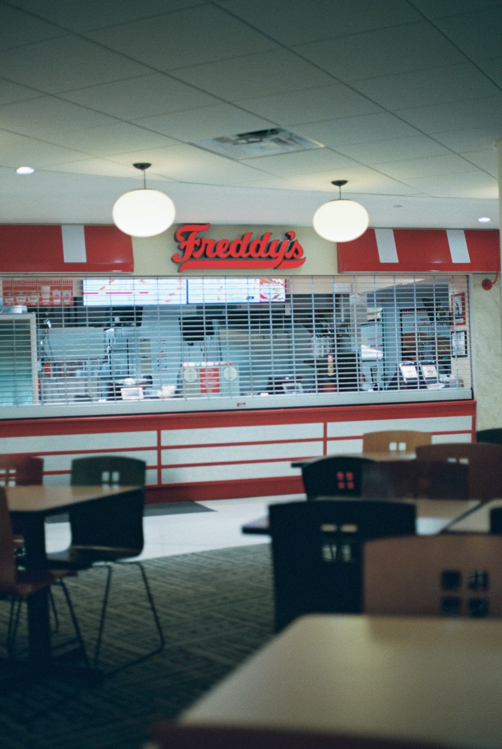 a restaurant with tables and chairs