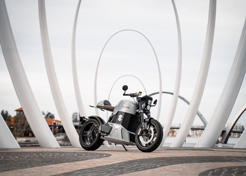 a motorcycle parked on a bridge