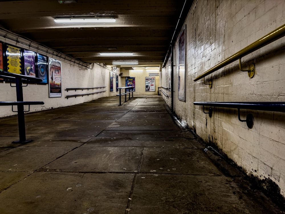 a hallway with posters on the wall