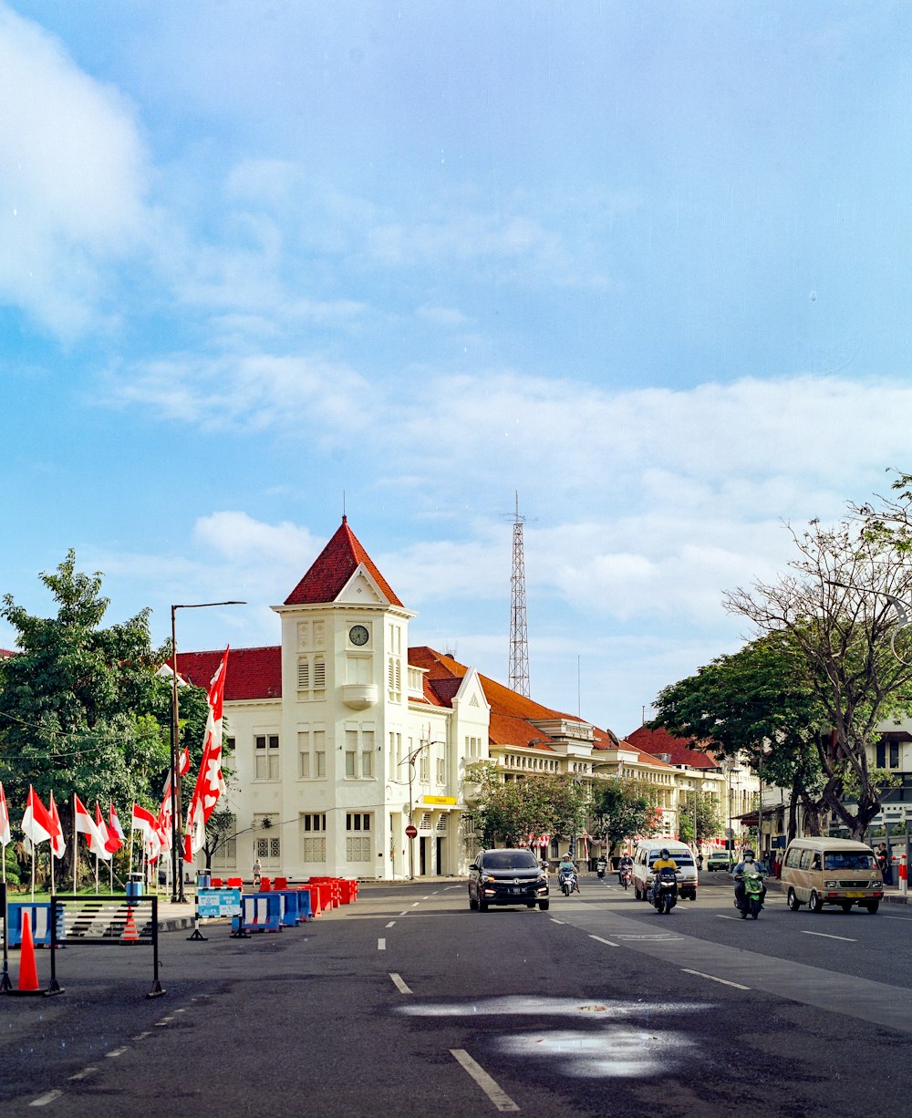 a street with cars and buildings along it