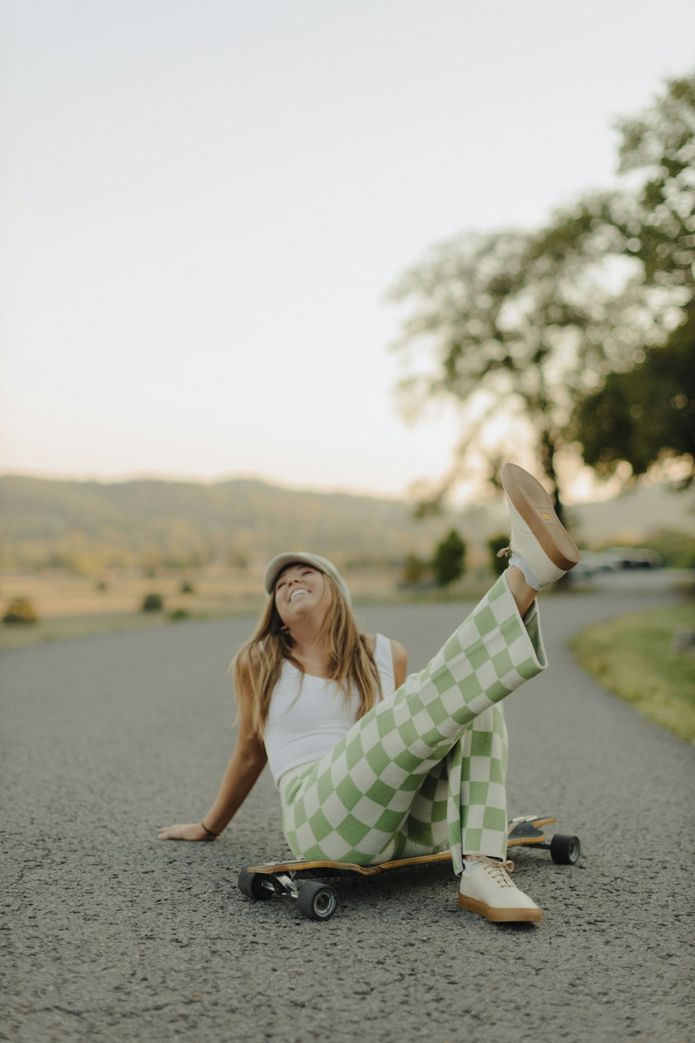 a person sitting on a skateboard