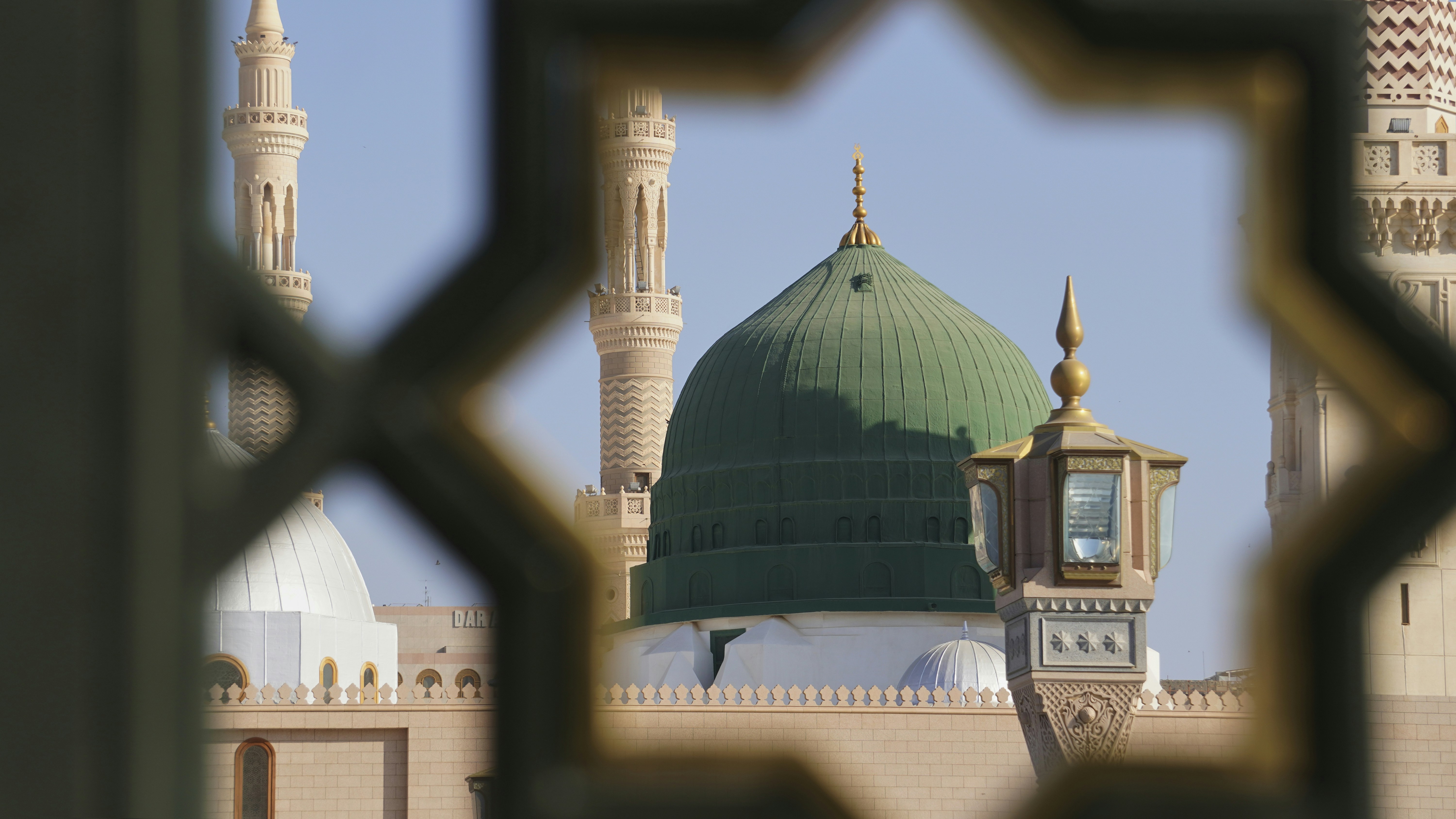 A photo of the green dome of the Prophet PBUH's mosque in Madina