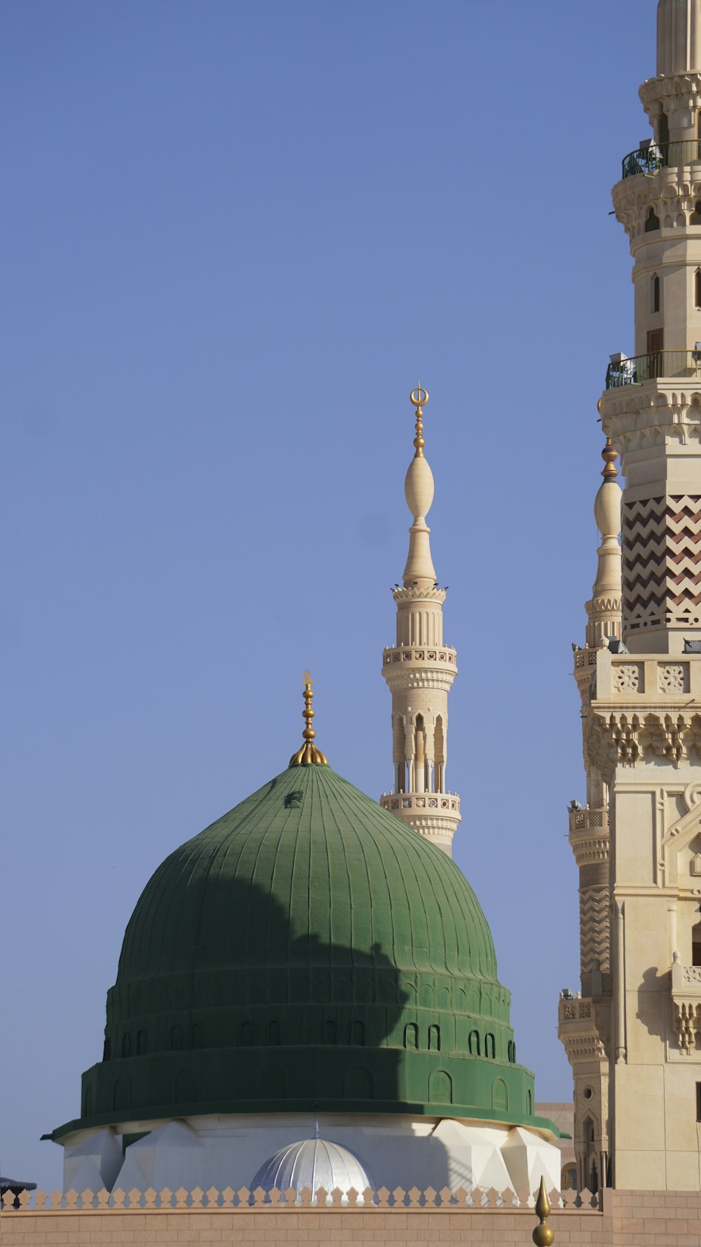 a domed building with a green dome