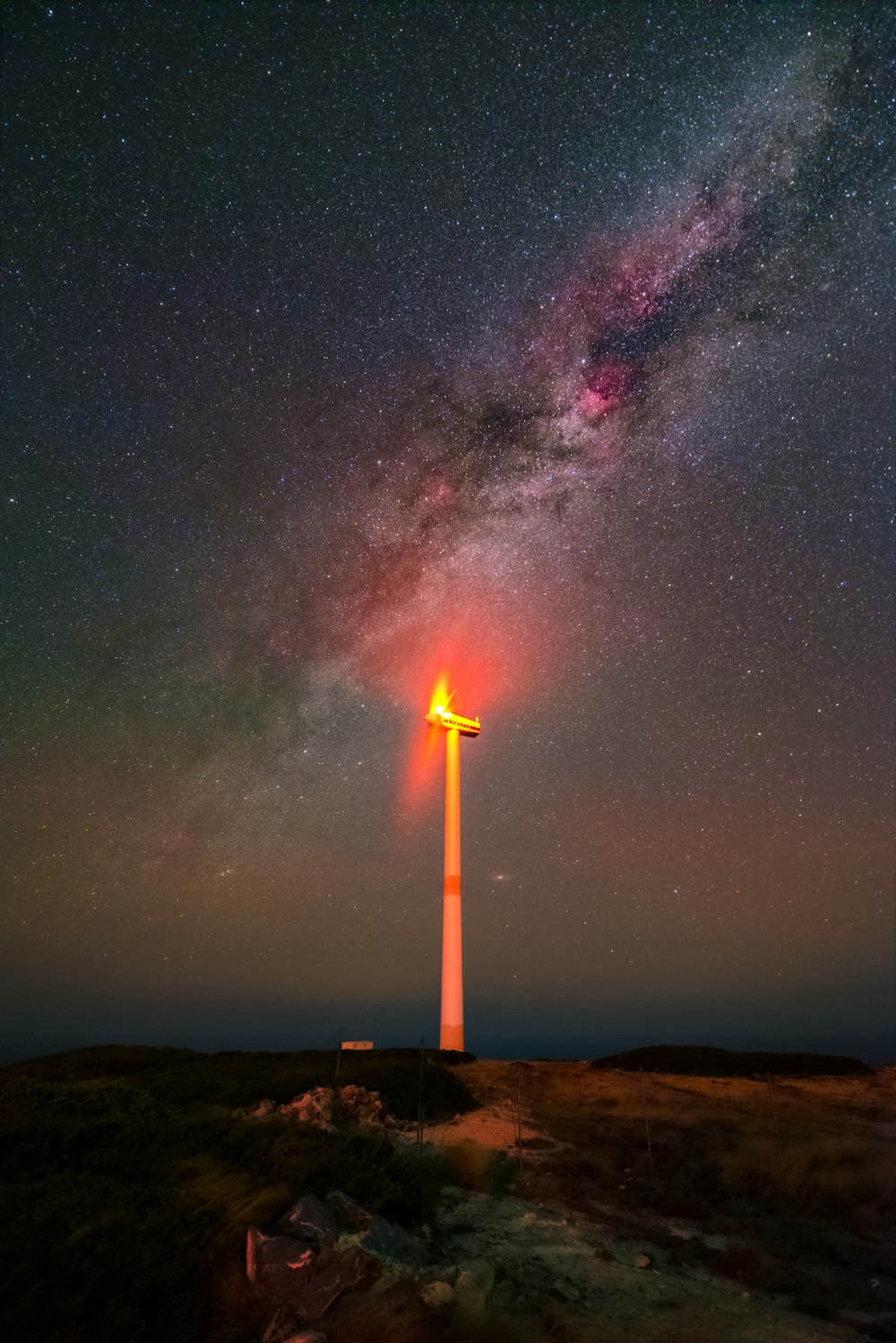 a rocket launching into the night sky