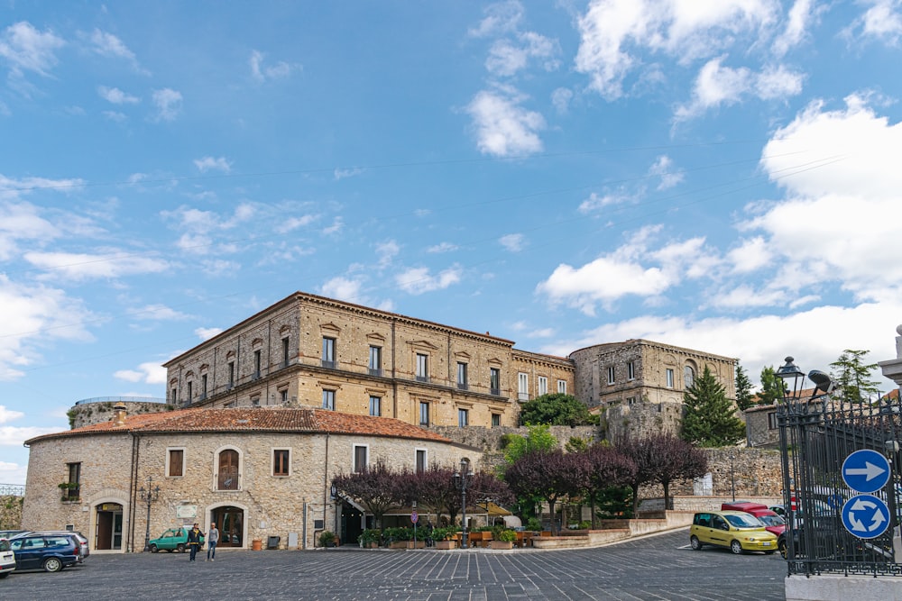 a large building with a fence around it