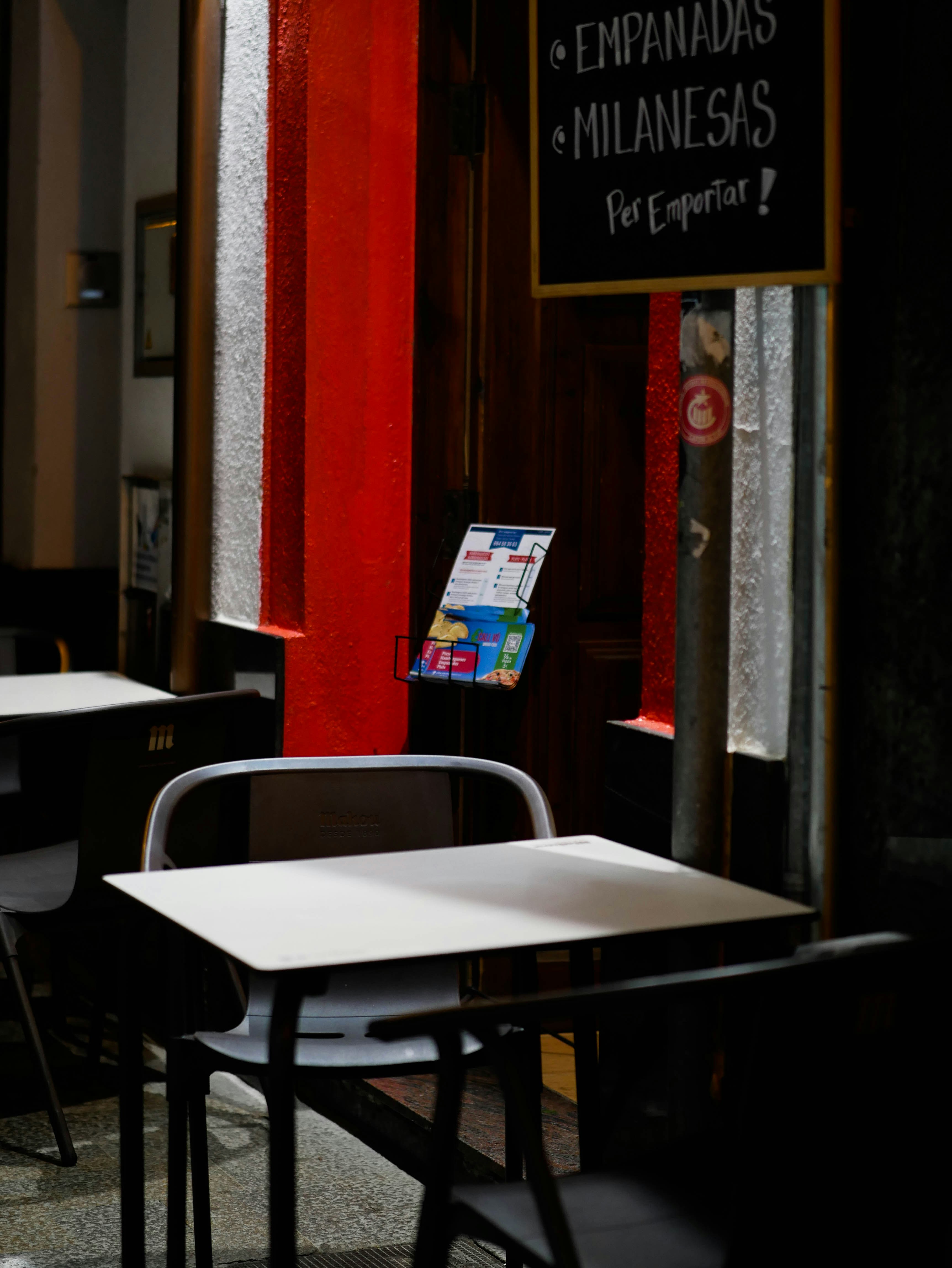 a table and chairs in a restaurant