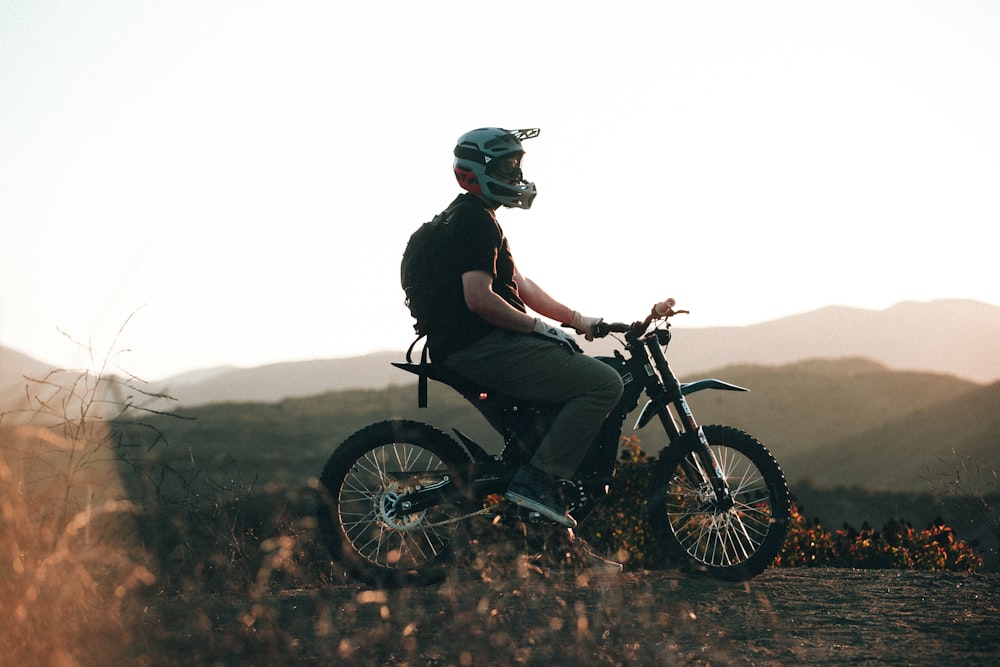 a man riding a motorcycle