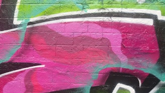 A vibrant podcast logo featuring pink, purple, and black colors.