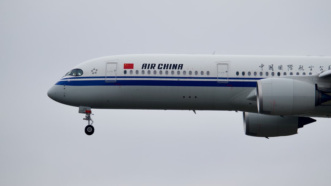 a large airplane flying in the sky, Air China Airbus A350 landing at Frankfurt Airport